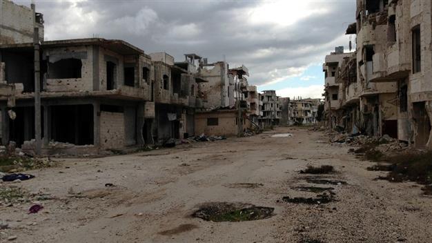 La distruzione del quartiere Baba Amr (Homs), dove è stata uccisa Marie Colvin. 11 febbraio 2013. Credist to: AFP.