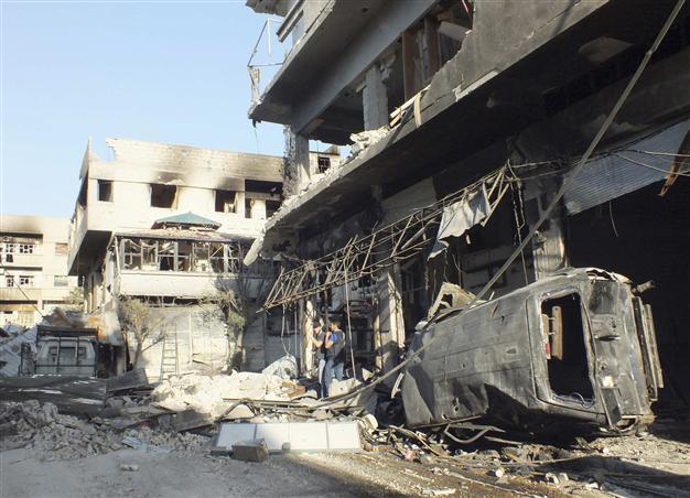 10 dead in Damascus police station bombing: NGO - World News