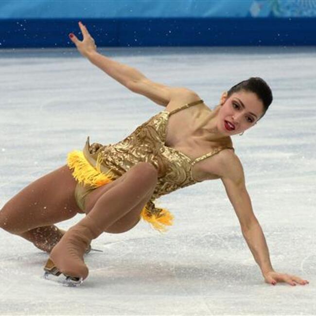 Italy's Stefania Berton falls as she performs in the Figure Skating Pa...